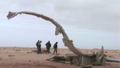 القذافي في مواجهة ميتران