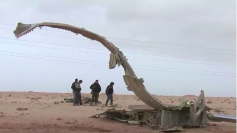 القذافي في مواجهة ميتران