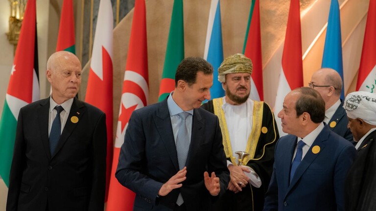 مصافحة السيسي والأسد